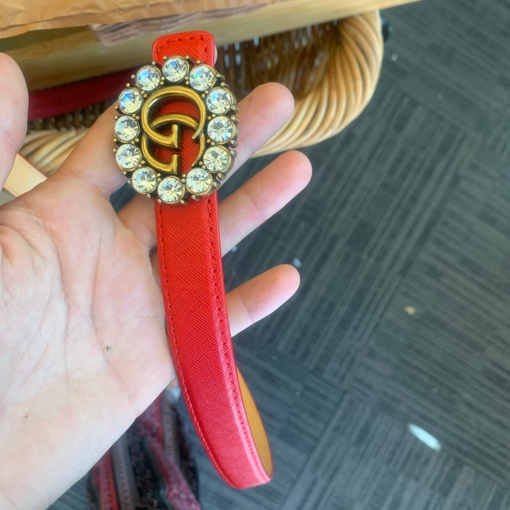 thin red Gucci belt with crystals